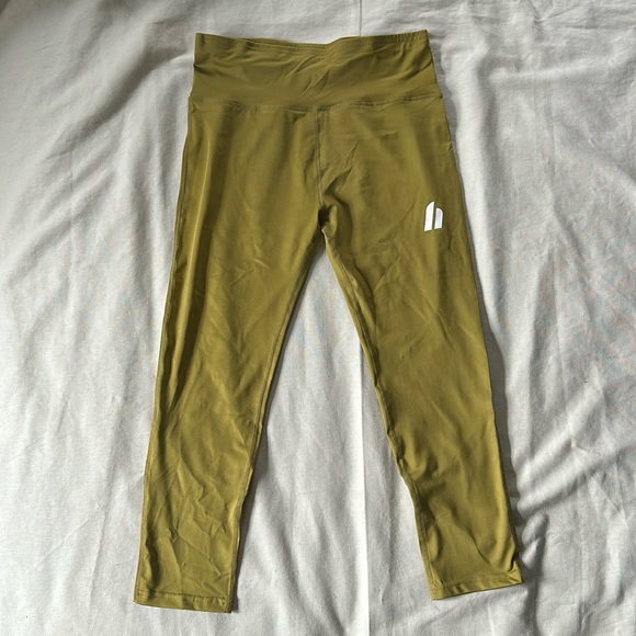 Olive Capri-length Leggings from MuscleNation - Picture 1 of 4